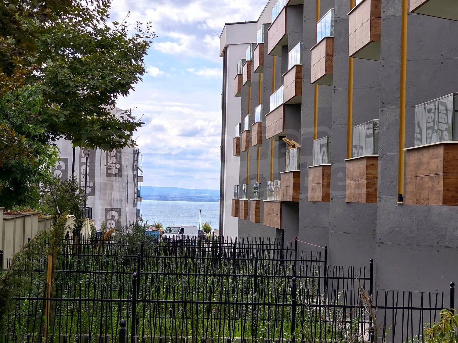 outside, facade, sea, green area
