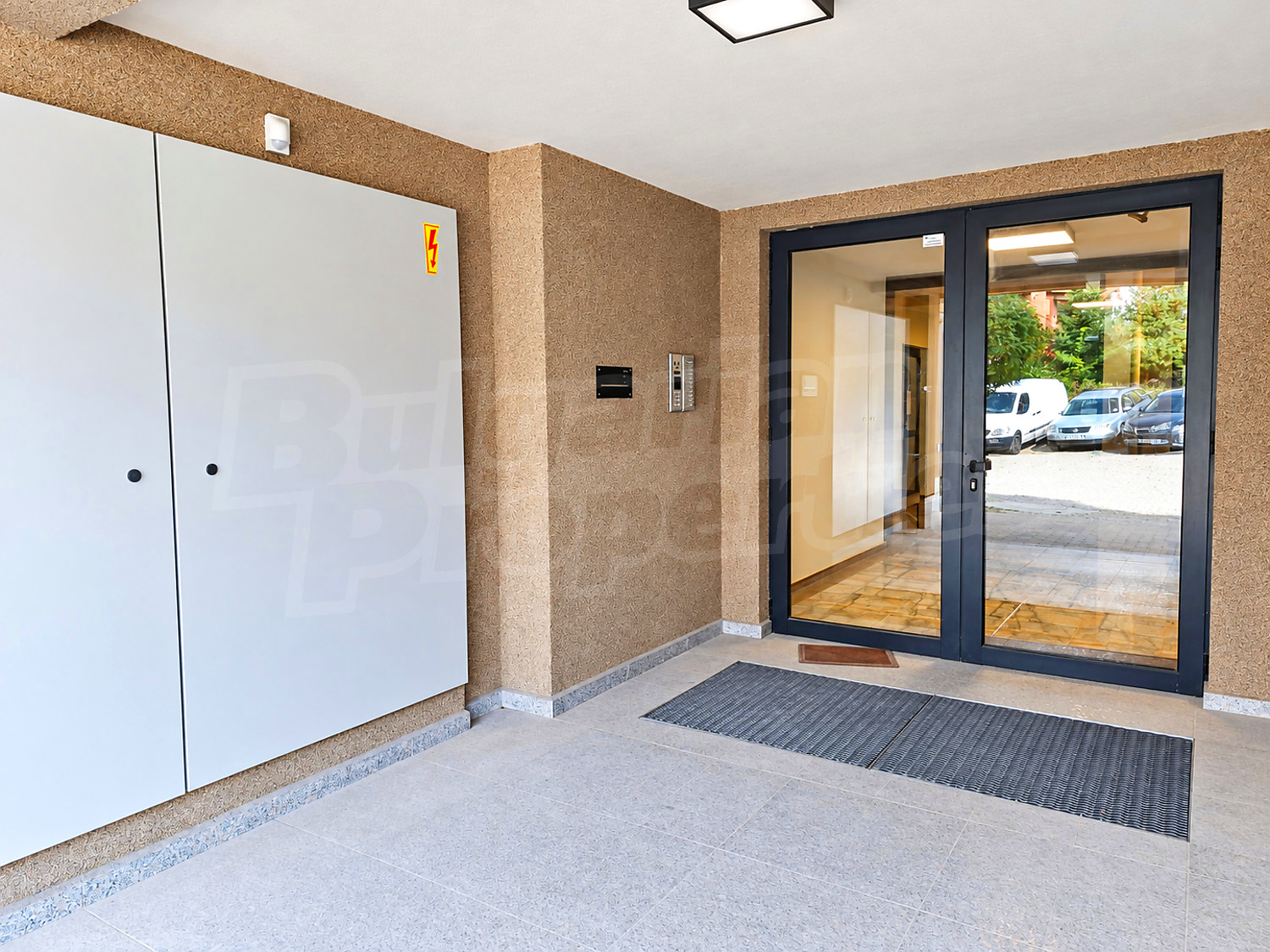 inside building entrance, parking