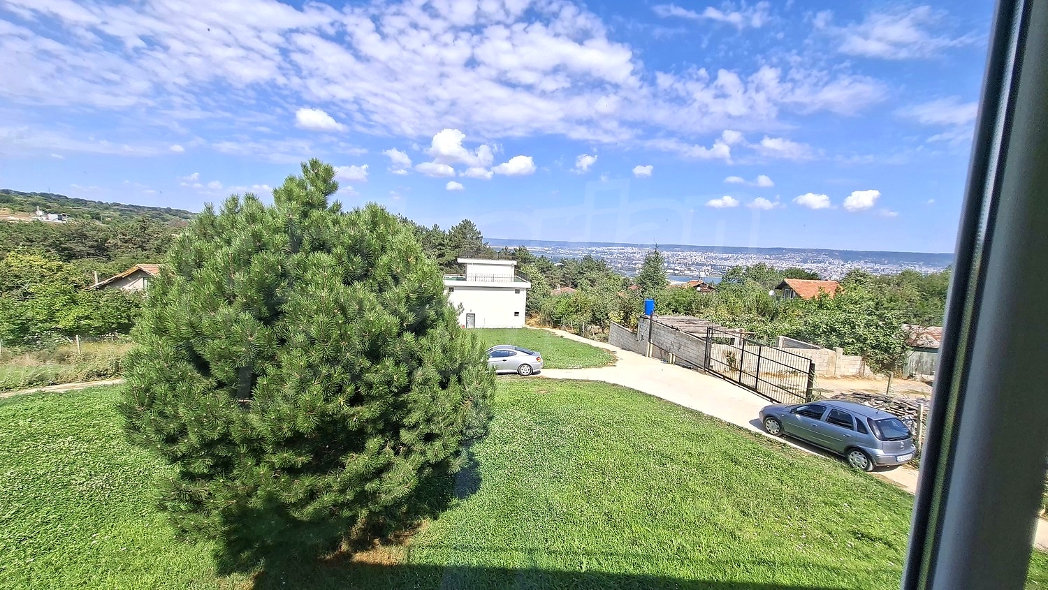 outside, view from balcony, green area