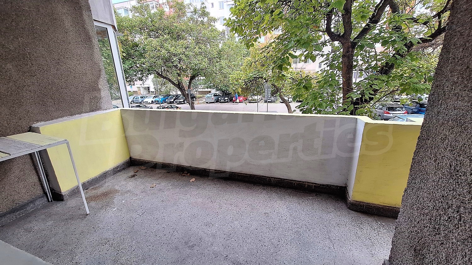 balcony, outside, parking, green area