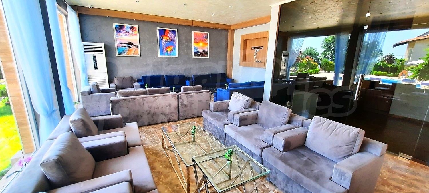 inside, living room, furnished, outside, garden, pool