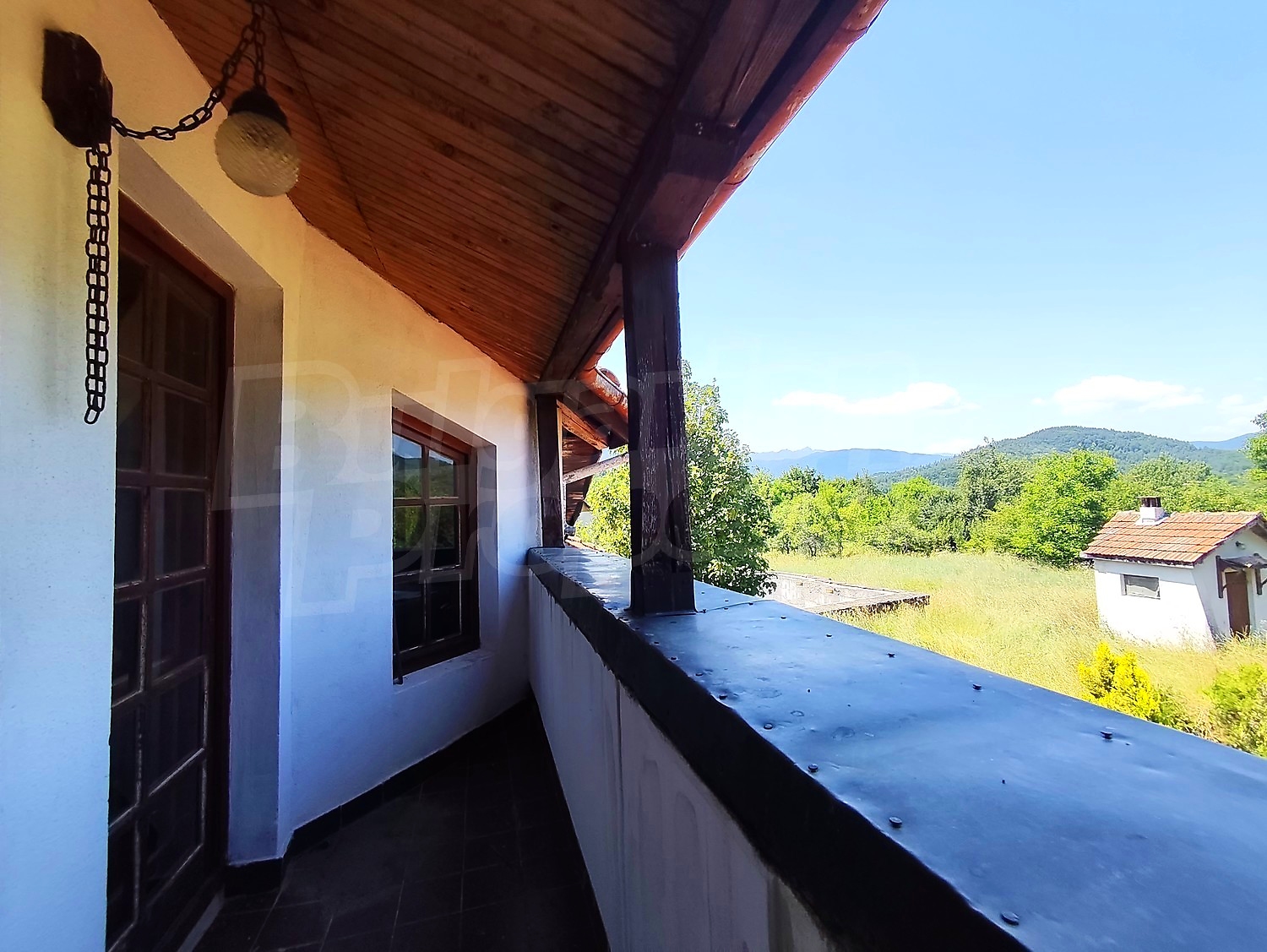 balcony, outside, view from balcony, mountain, green area