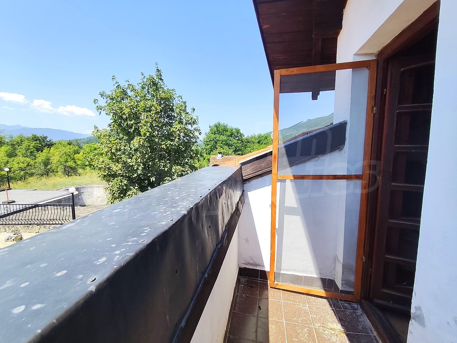 balcony, outside, view from balcony, mountain, green area