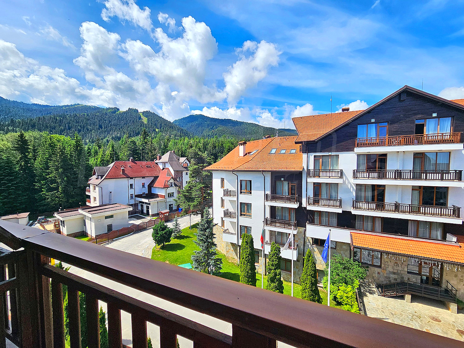 outside, view from balcony, mountain, green area, facade