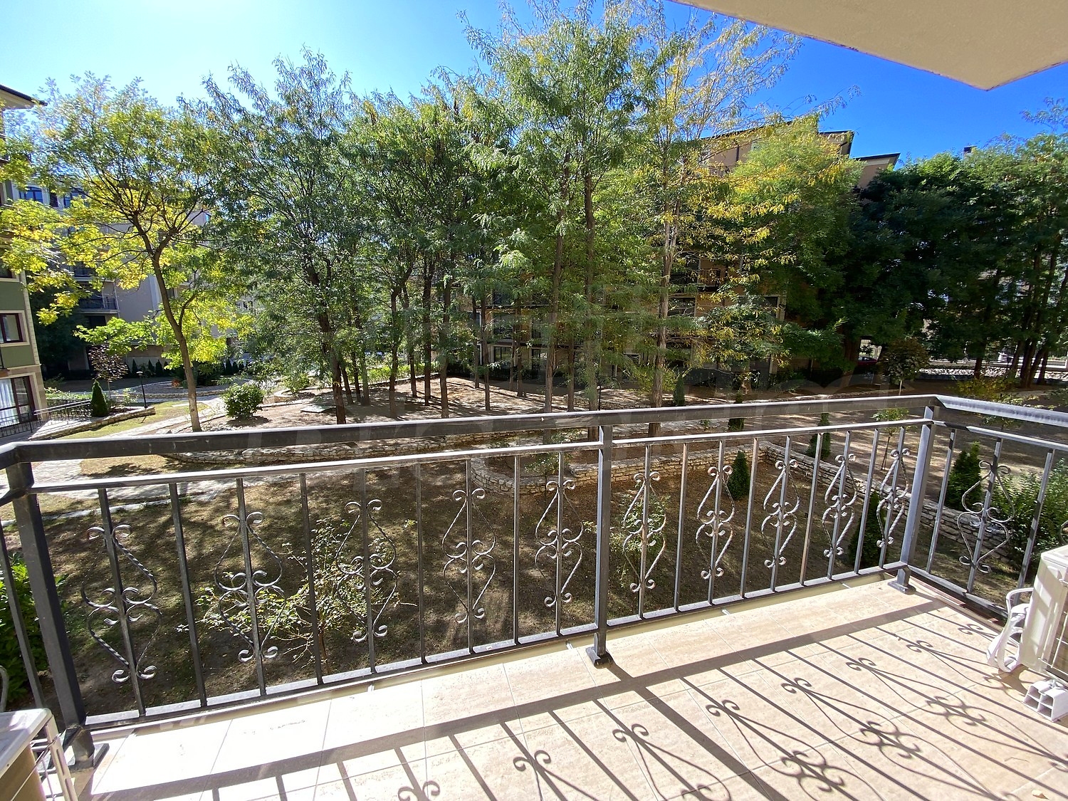 outside, view from balcony, balcony, green area