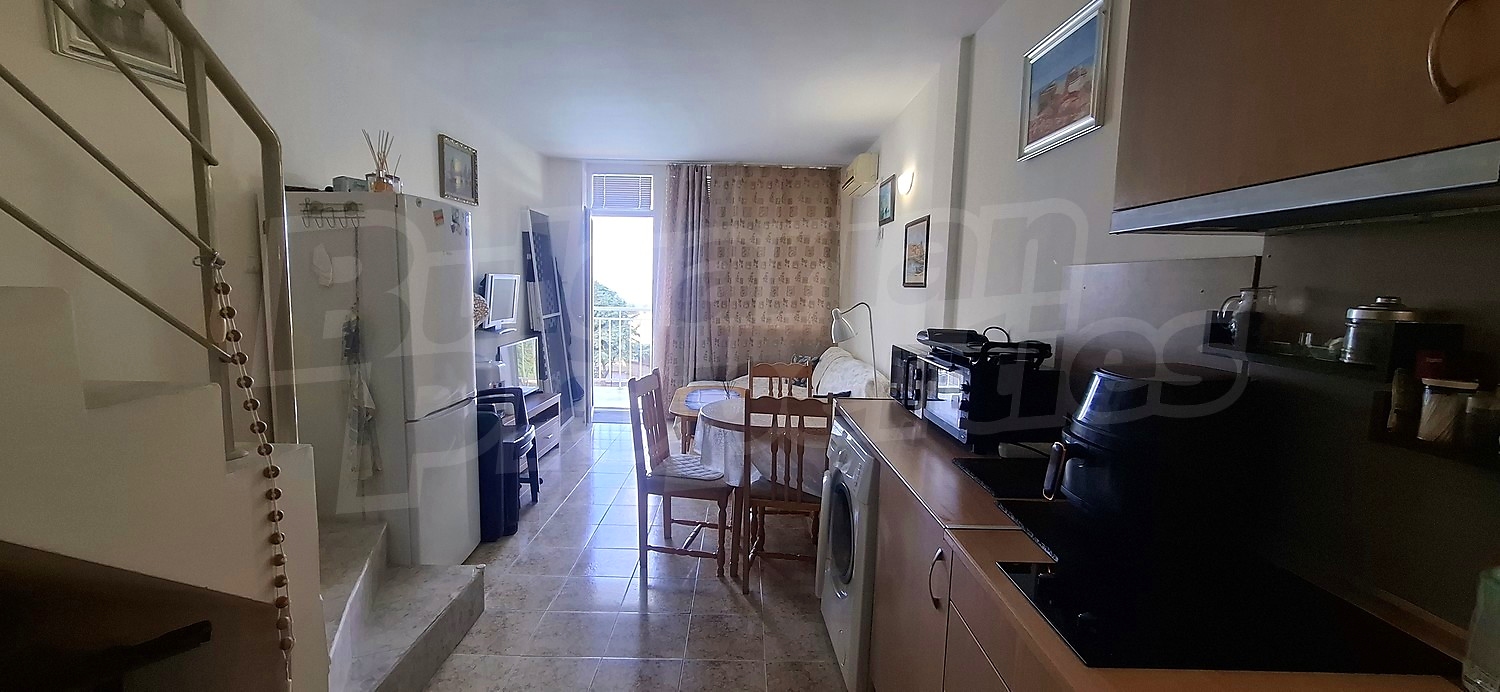 inside, kitchen, living room, view from balcony, stairs
