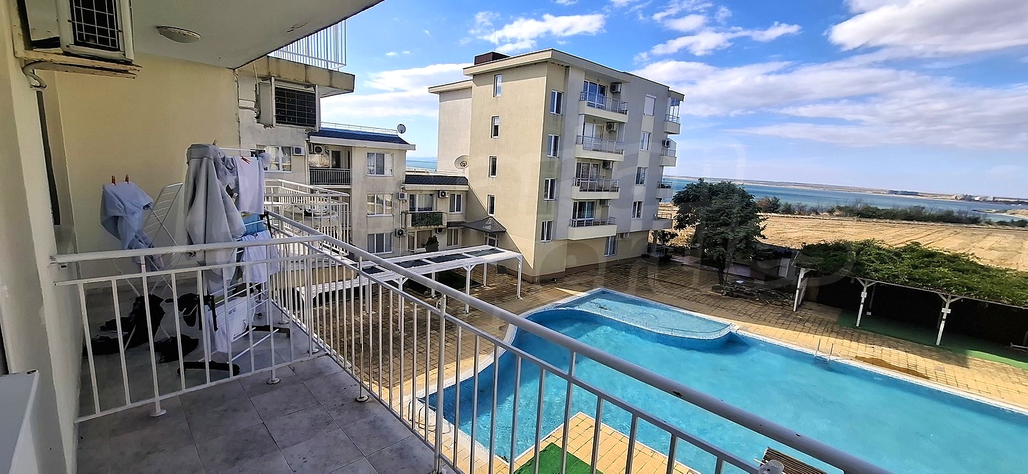 balcony, pool, view from balcony, outside, sea