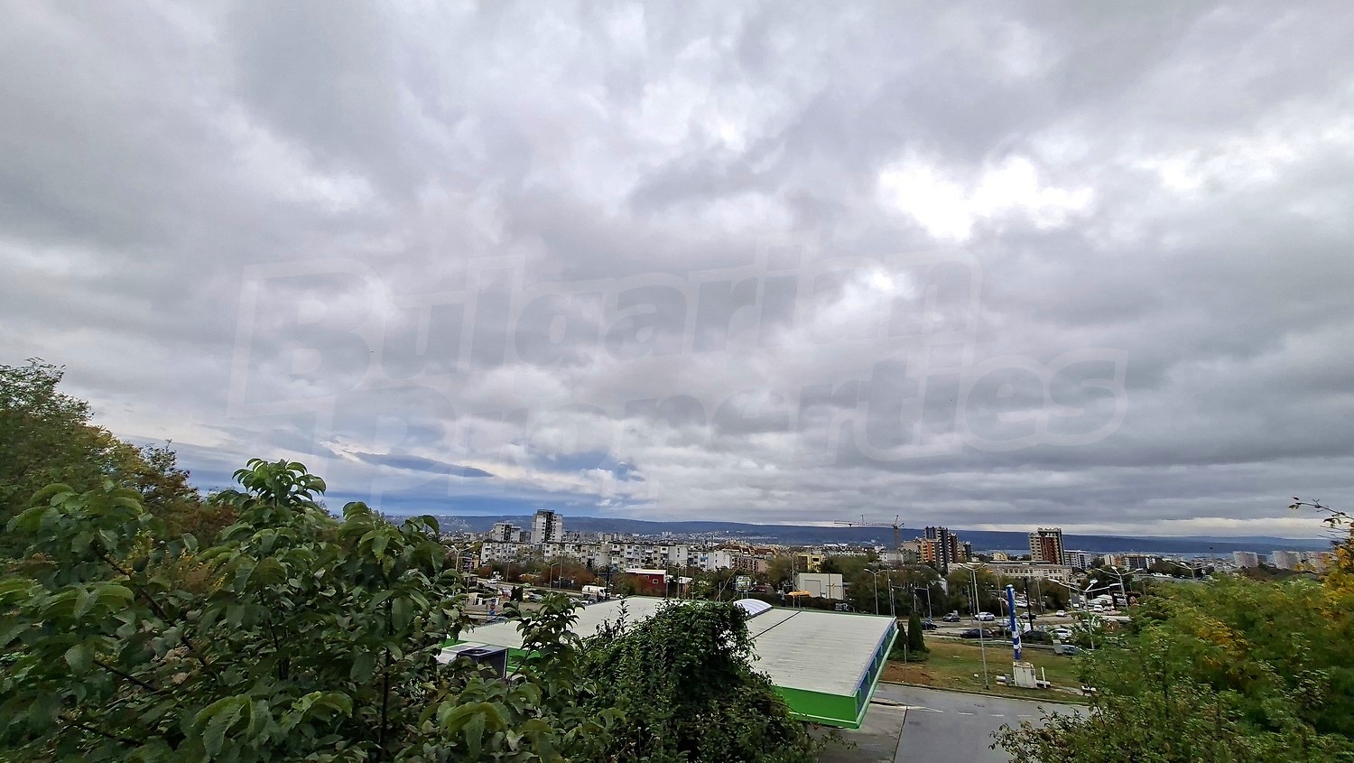 outside, view from balcony, green area