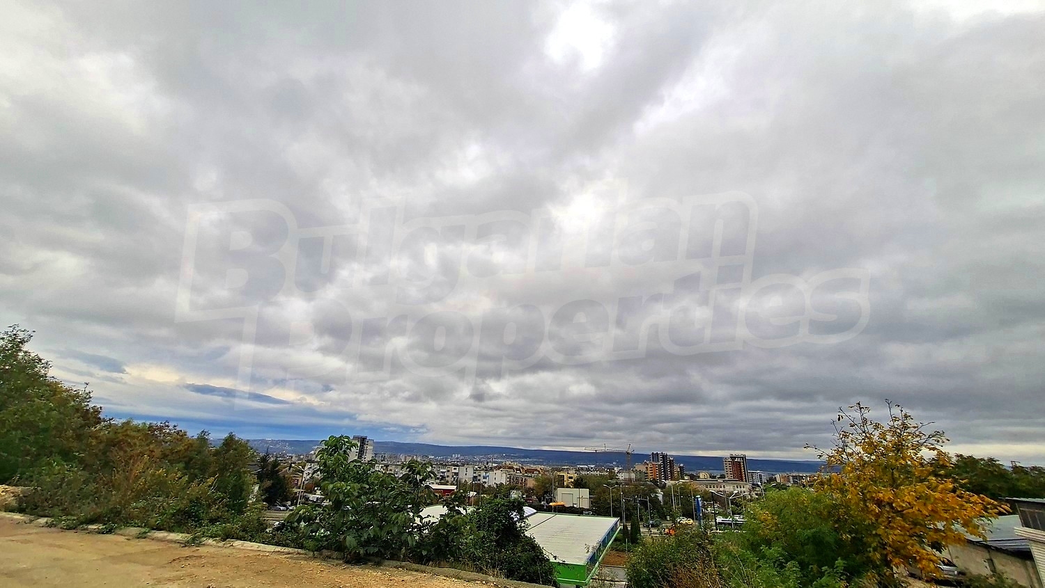 outside, view from balcony, green area