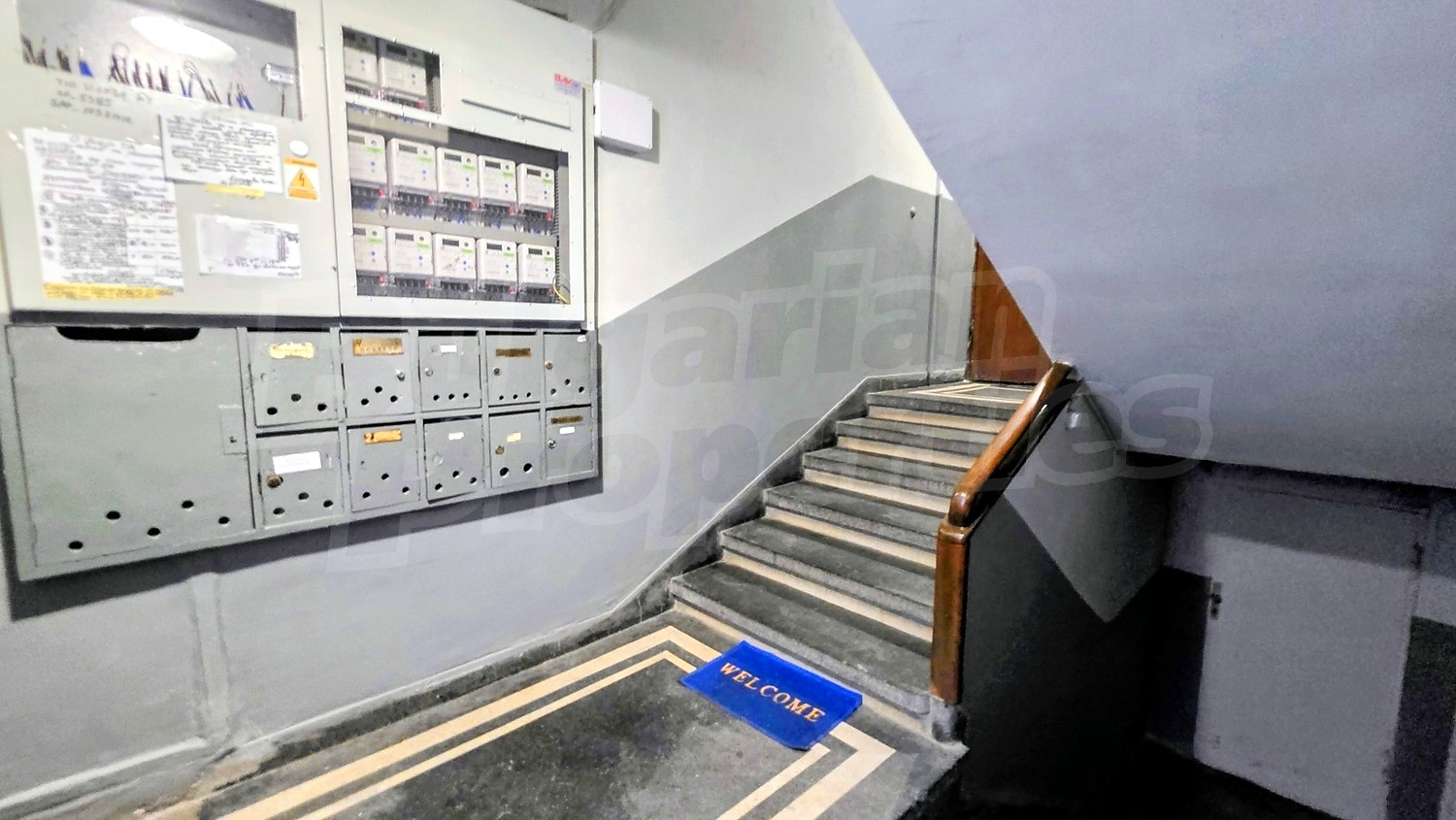 inside building entrance, stairs