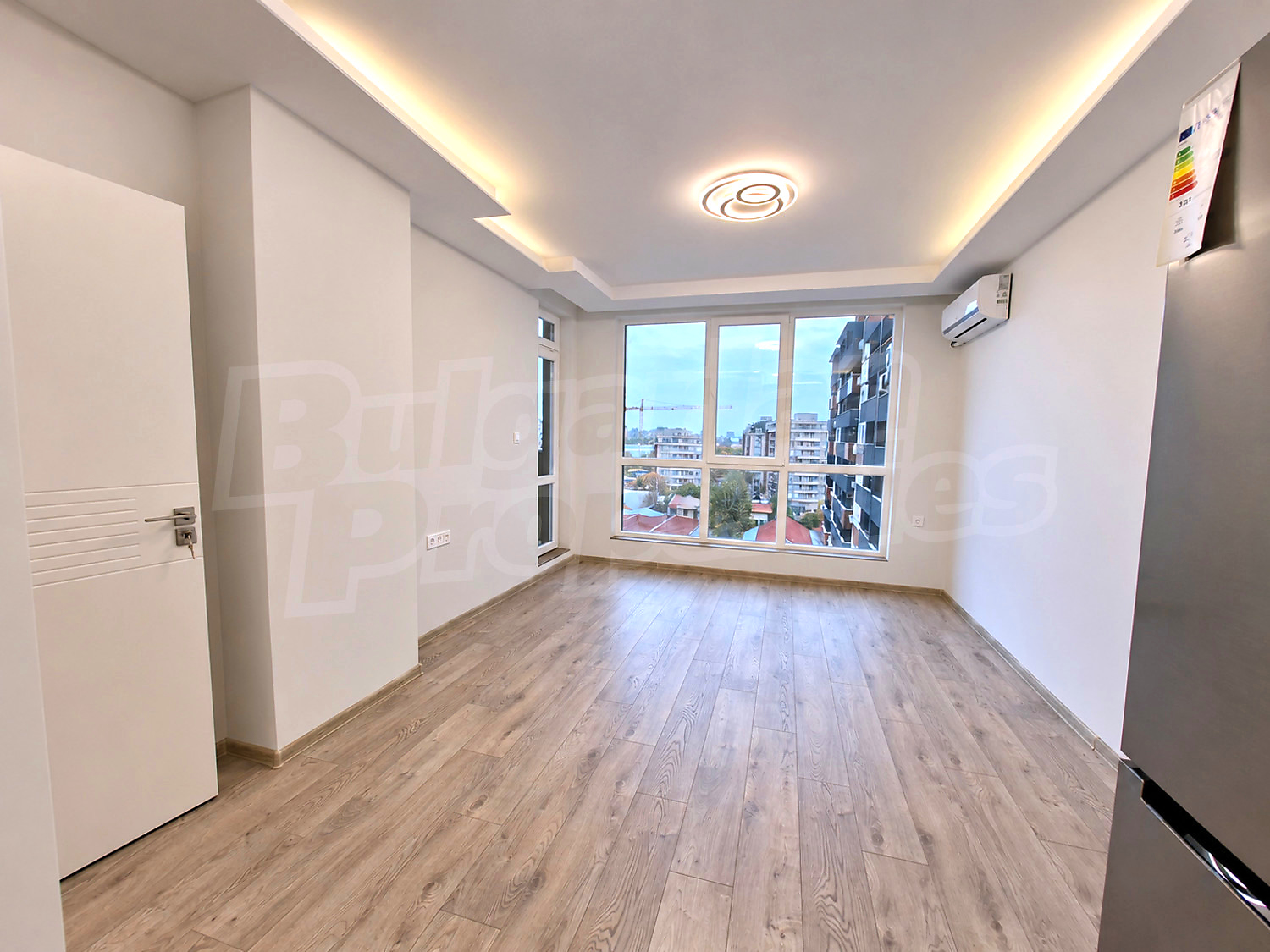 inside, living room, view from balcony, furnished