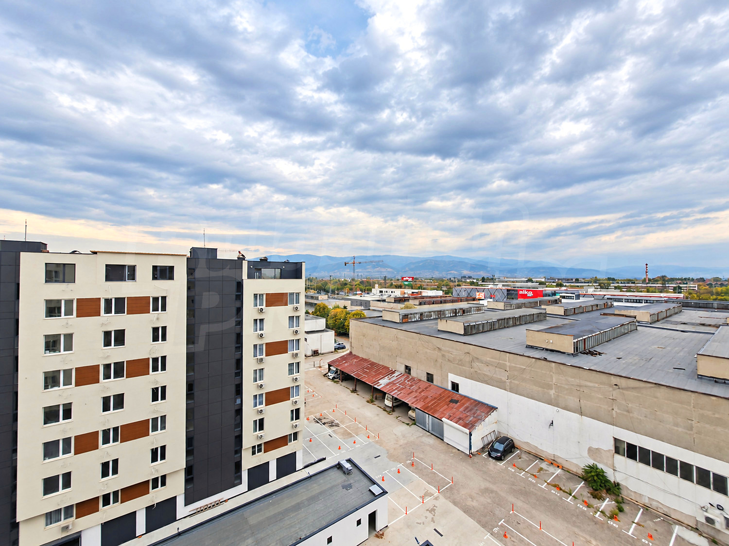 outside, view from balcony, facade, parking, mountain