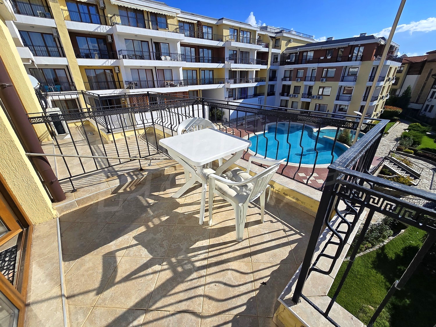 balcony, pool, outside, view from balcony, green area