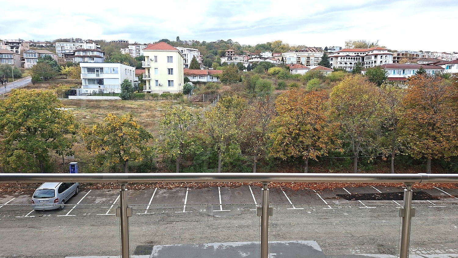 outside, view from balcony, parking, green area