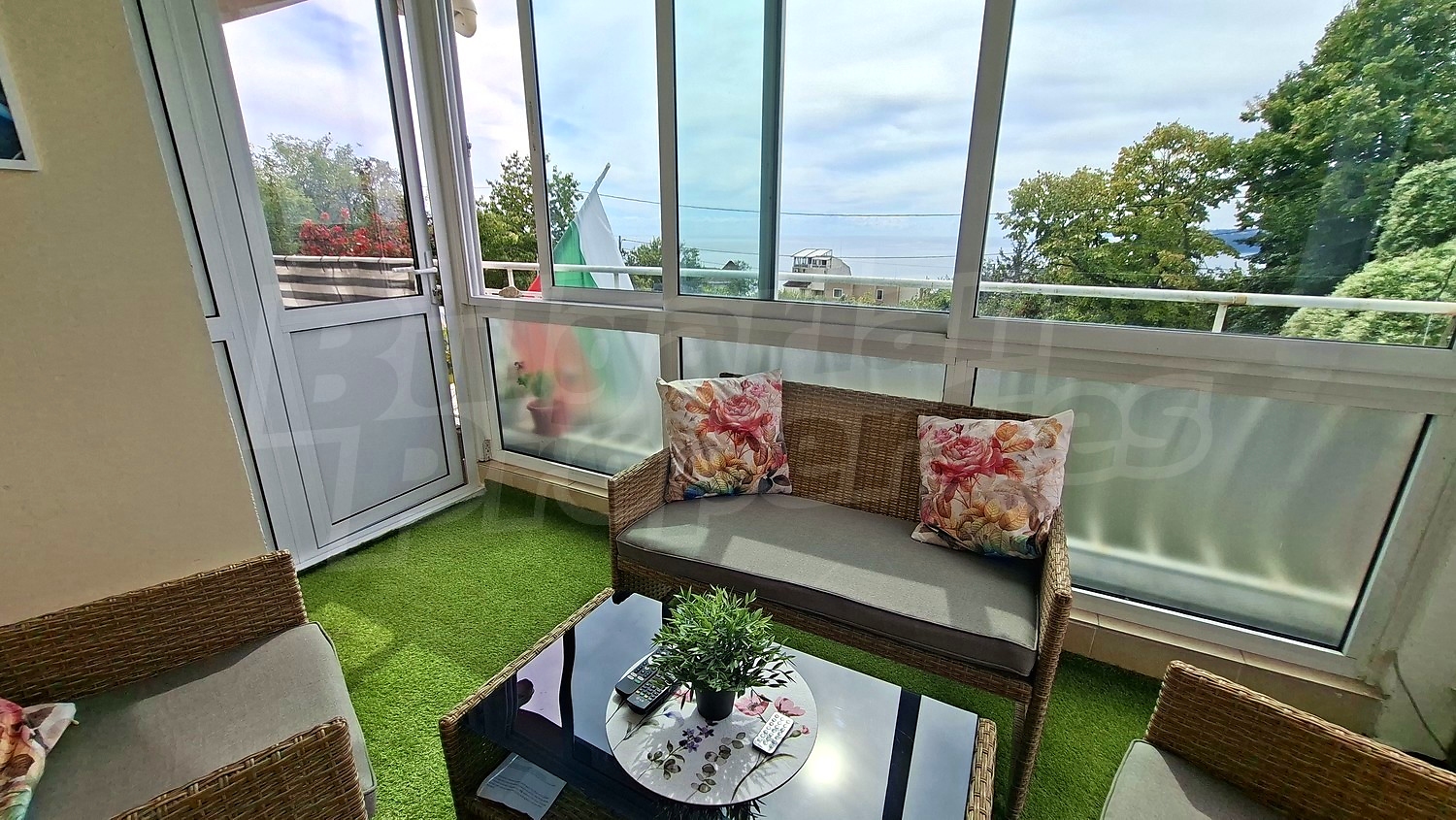 balcony, furnished, view from balcony, outside, green area