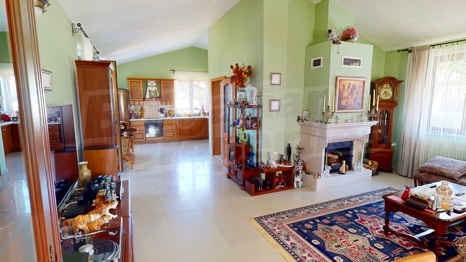 inside, living room, kitchen, furnished, fireplace