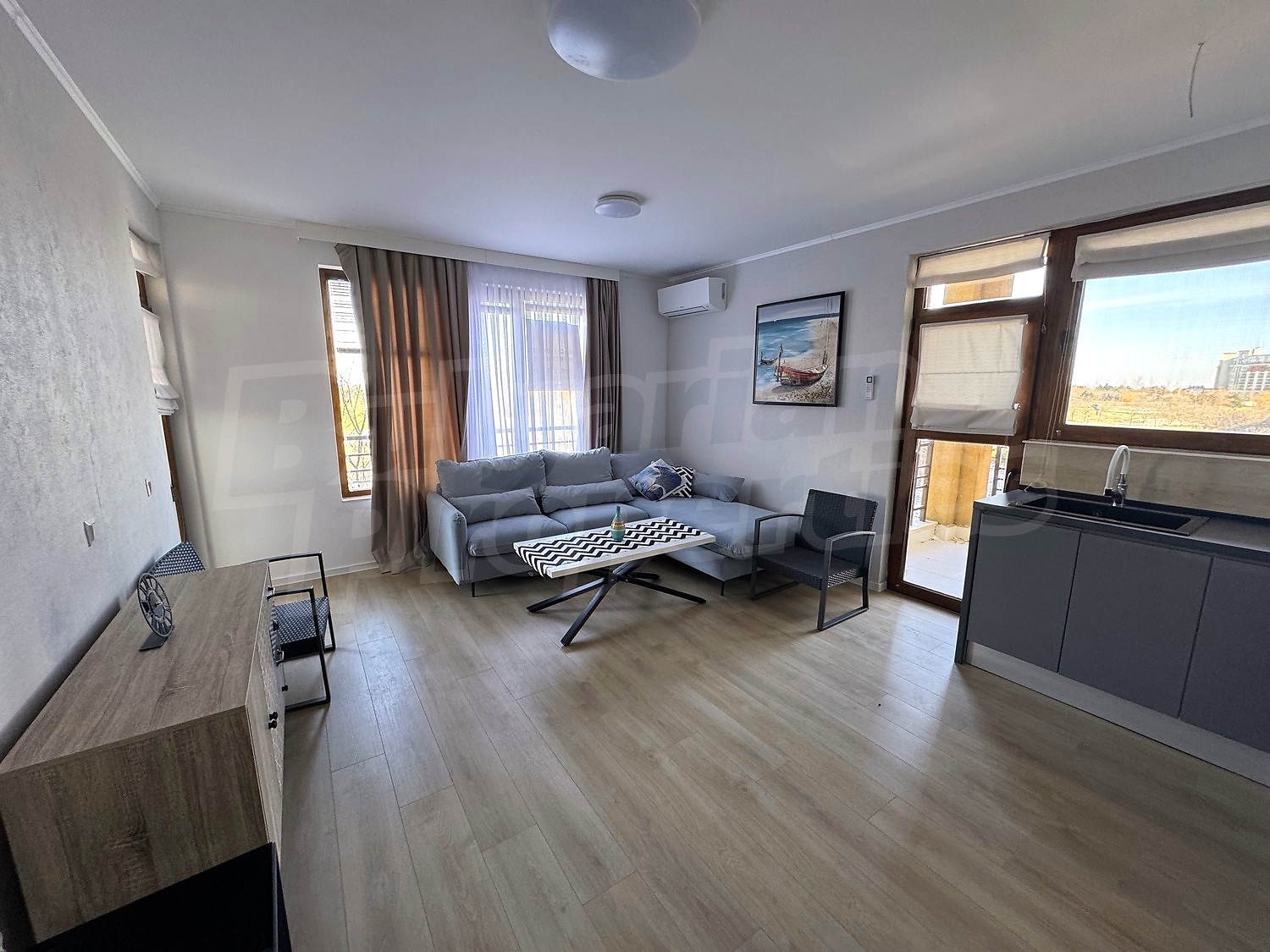 inside, living room, furnished, view from balcony
