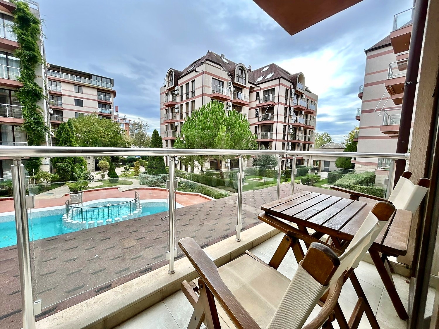 balcony, outside, view from balcony, pool, garden