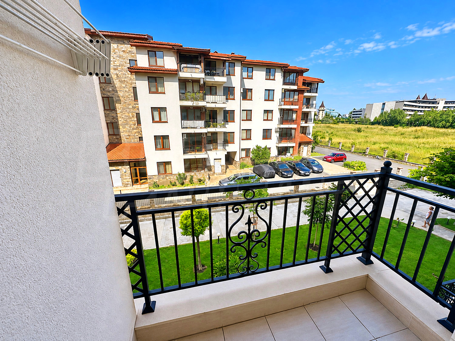 balcony, outside, view from balcony, garden, parking