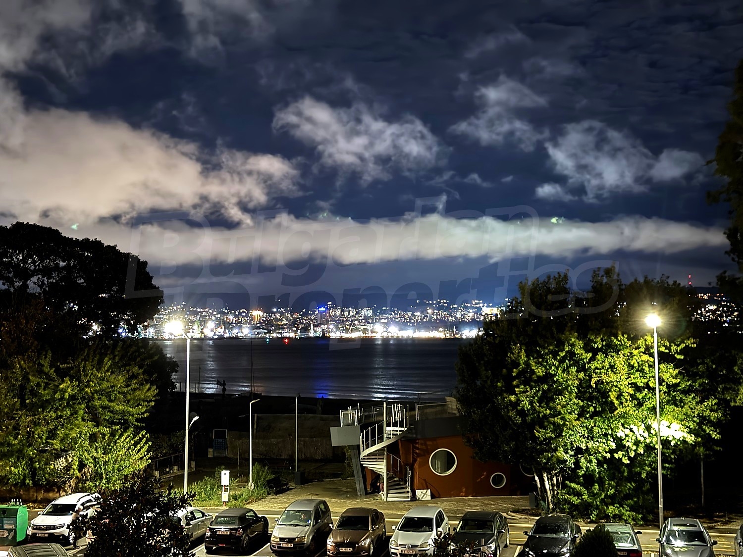 outside, view from balcony, parking, sea