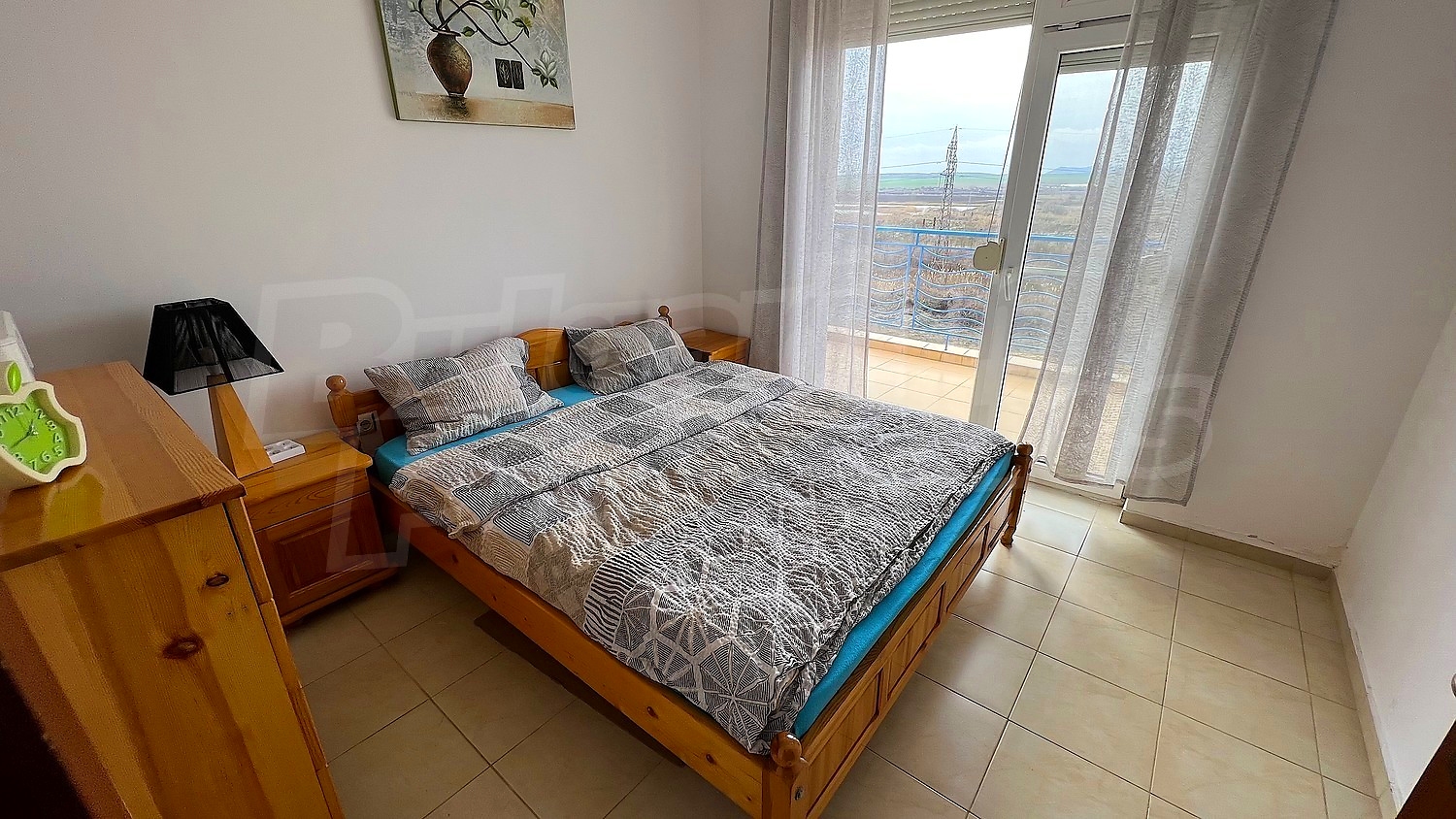 inside, bedroom, furnished, view from balcony