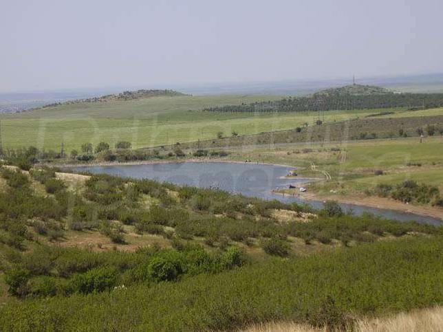 Regulated plot of land overlooking a lake Regulated plot of land overlooking a lake