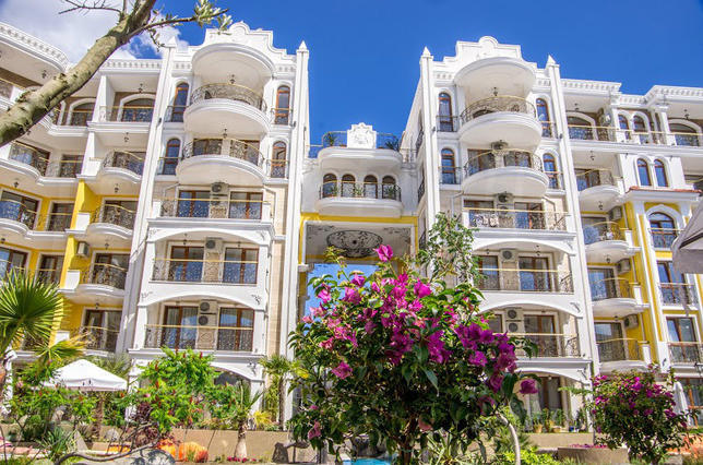 Modern apartments in a gated complex with many extras 300 m from the beach
