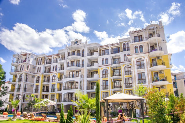 Modern apartments in a gated complex with many extras 300 m from the beach