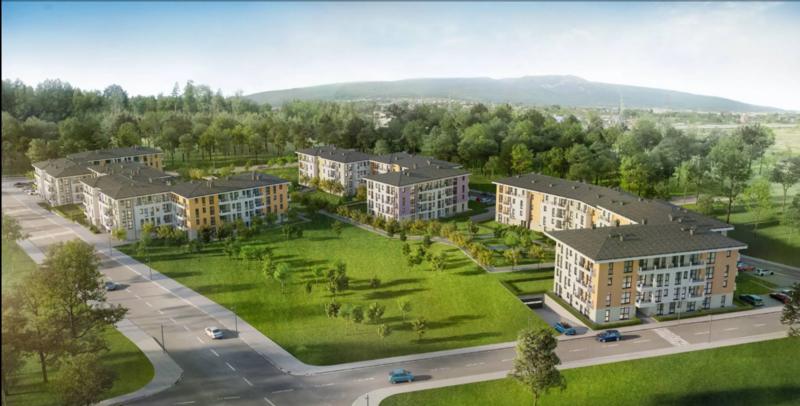 Modern apartments with garden access and children's playground.