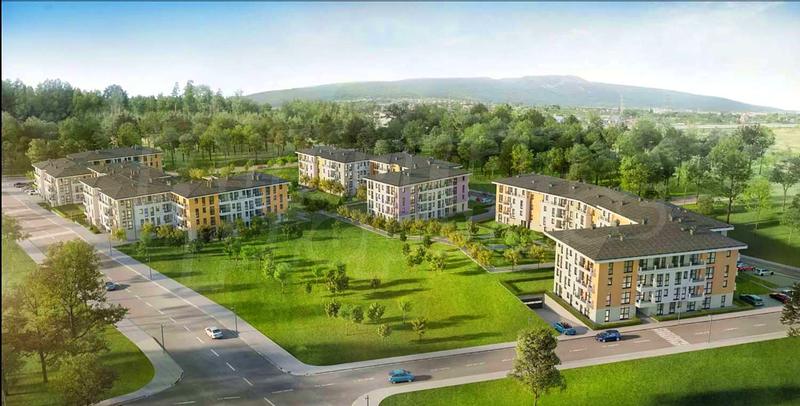 Modern apartments with garden access and children's playground.