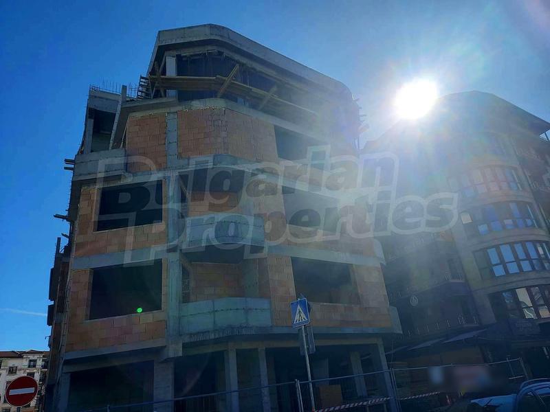 New building under construction near the center of the seaside town New building under construction near the center of the seaside town