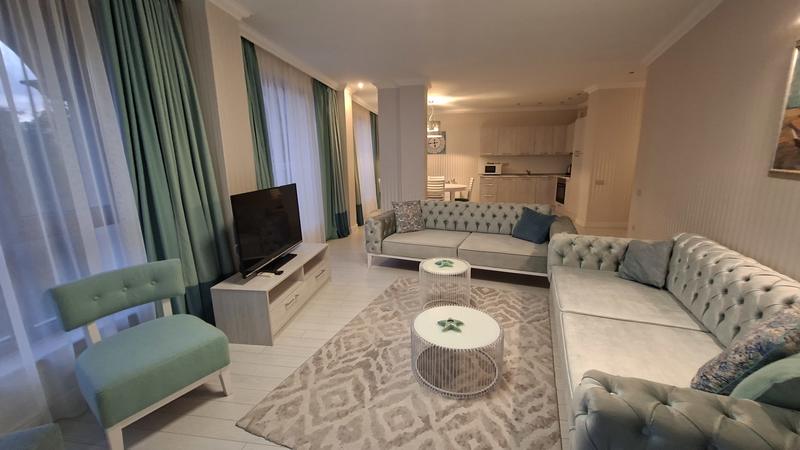 Stylishly furnished home with three bedrooms and two bathrooms in a premium seaside complex