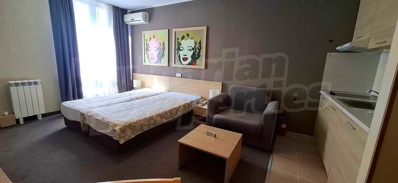 South-facing studio in year-round gated complex with indoor and outdoor swimming pools