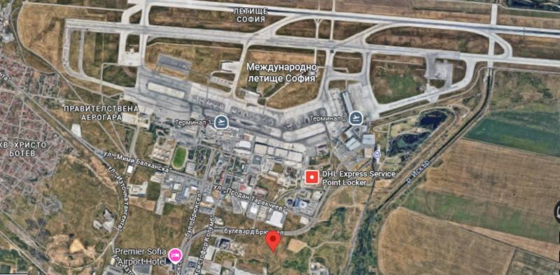 Flat terrain with frontage on two streets adjacent to warehouses, hotels, logistics companies