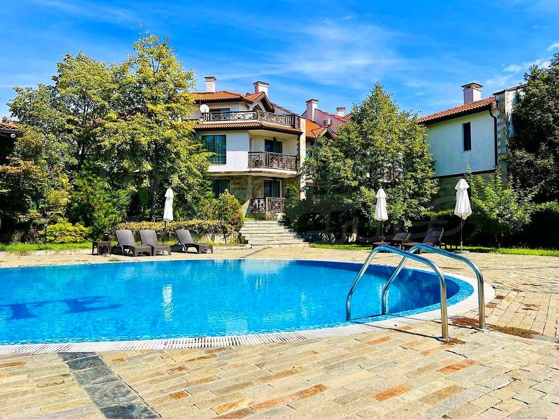 Properties in a complex with richly landscaped garden and swimming pool just 1200 meters from the beach