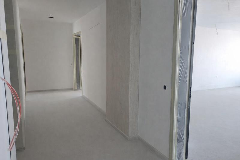 Apartments and shops in a new building near a metro station, public transport, supermarkets and a shopping center