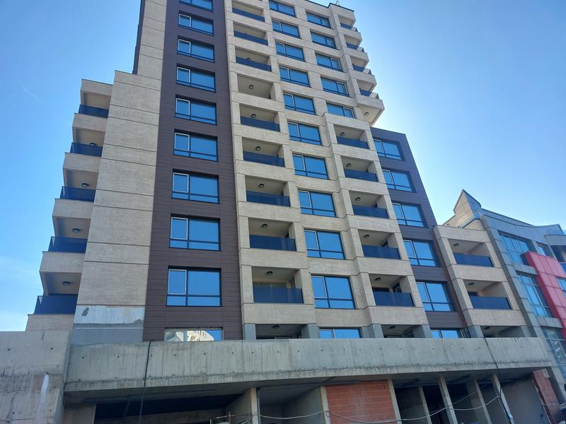 Apartments and shops in a new building near a metro station, public transport, supermarkets and a shopping center
