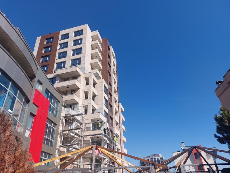 Apartments and shops in a new building near a metro station, public transport, supermarkets and a shopping center