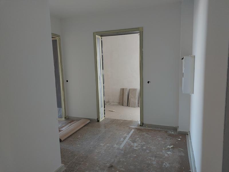 Apartments and shops in a new building near a metro station, public transport, supermarkets and a shopping center