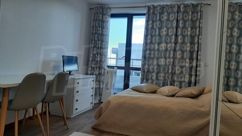 Apartment with partial sea view next to schools, main boulevard, greenery