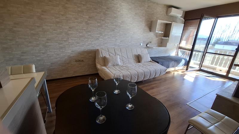 Comfortably furnished studio with fireplace and parking lot