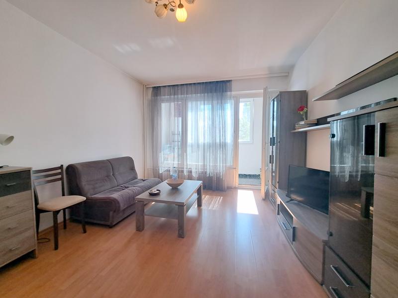 Bright and Fully Furnished Apartment with a Separate Kitchen and Balcony