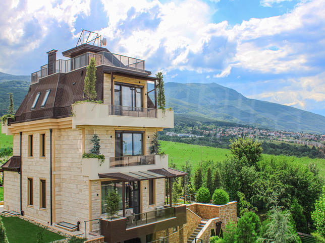 Stylish three-storey house with yard, garages, parking spaces and panoramic views Stylish three-storey house with yard, garages, parking spaces and panoramic views